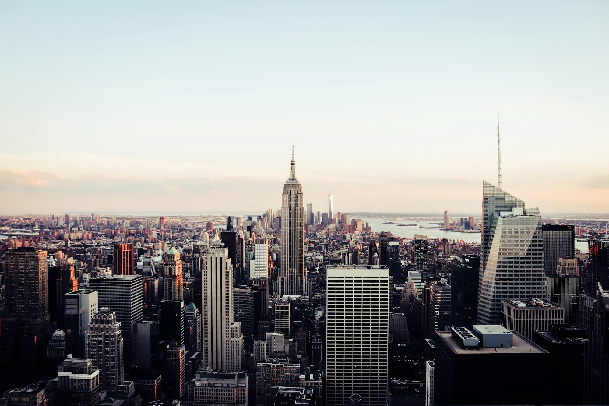 A city skyline where a traveller sets up an eSIM on iPhone